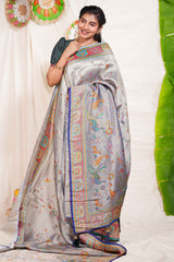 Grey floral and animal themed banarasi silk saree with contrast border matching blouse