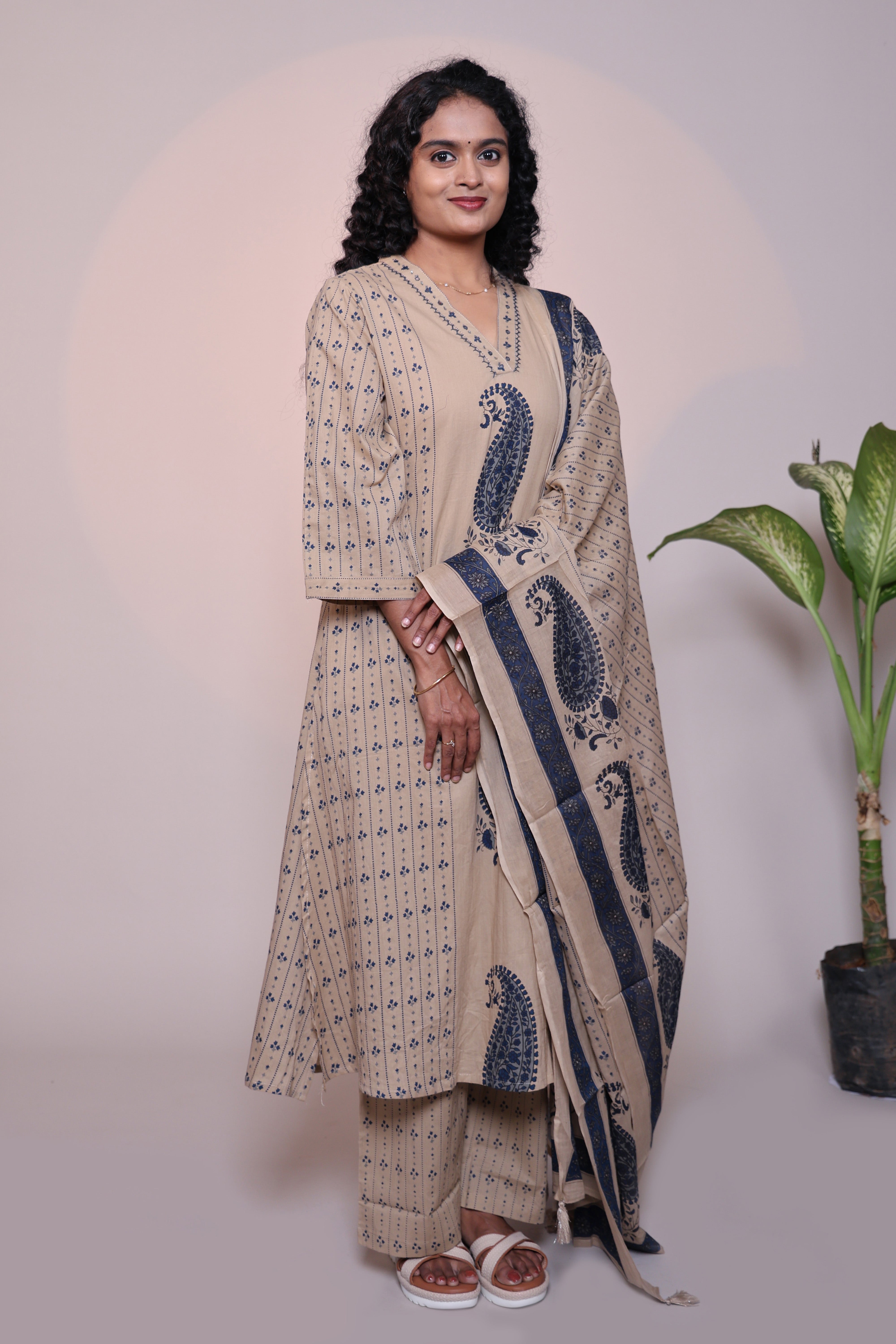 Light brown floral motifs 3/4 slevee salwar suit with matching pant and printed dupatta