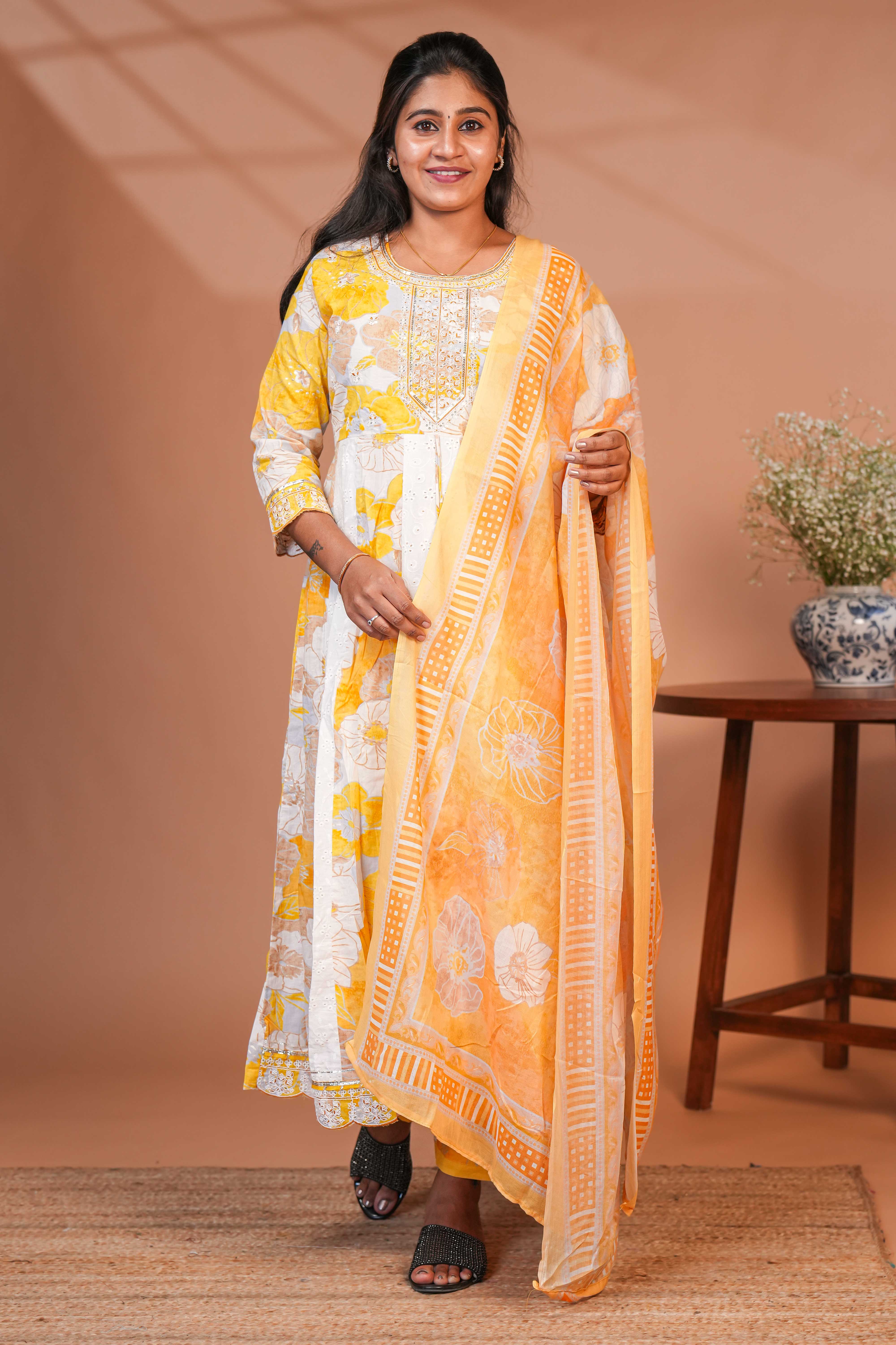 Yellow floral printed A line anarkali 3/4th slevee with round neck matching bottom