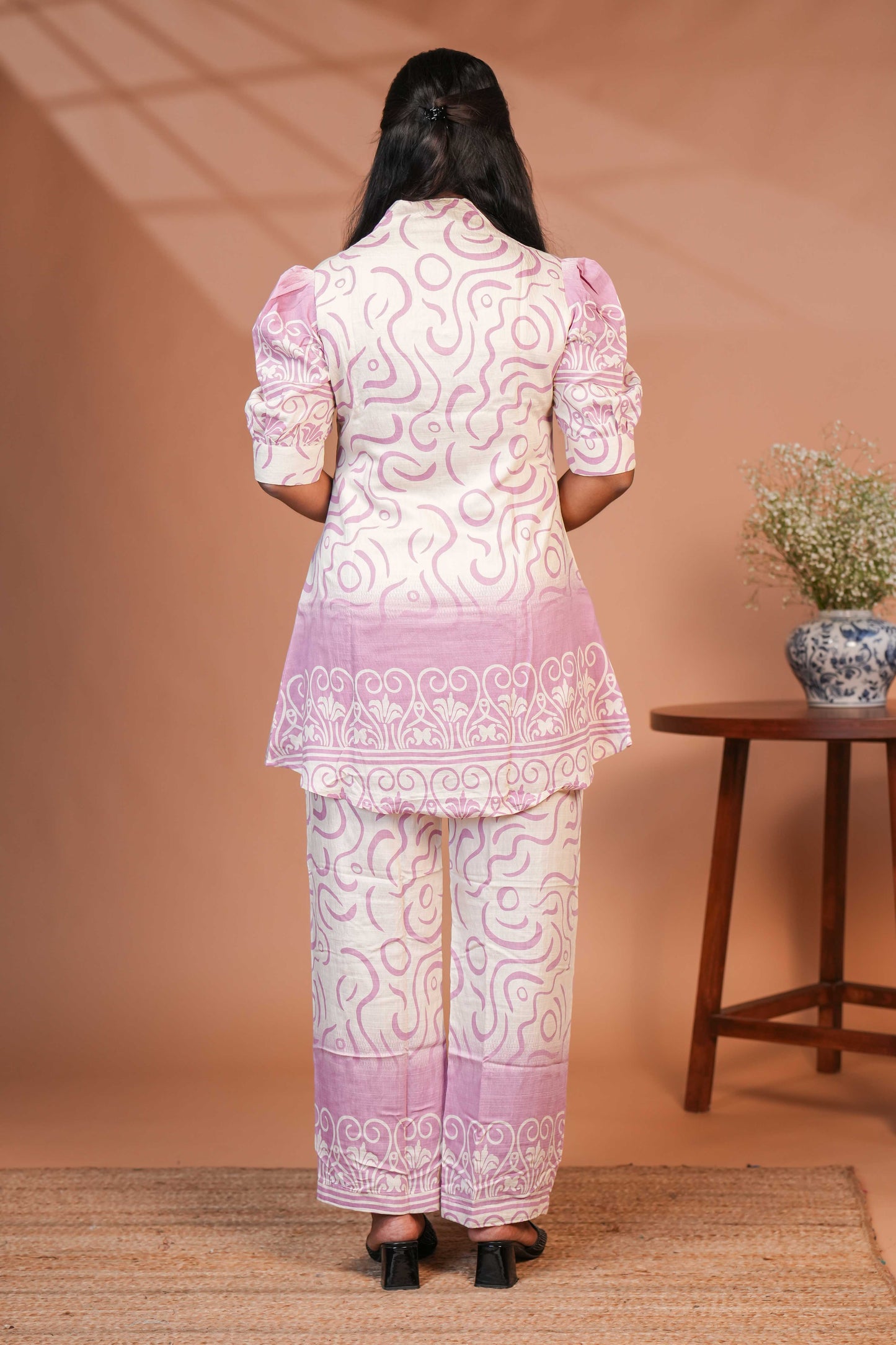 Cream swirl design queen anne neck salwar set with puff sleeve, self printed bottom