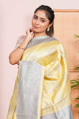 yellow and silver saree