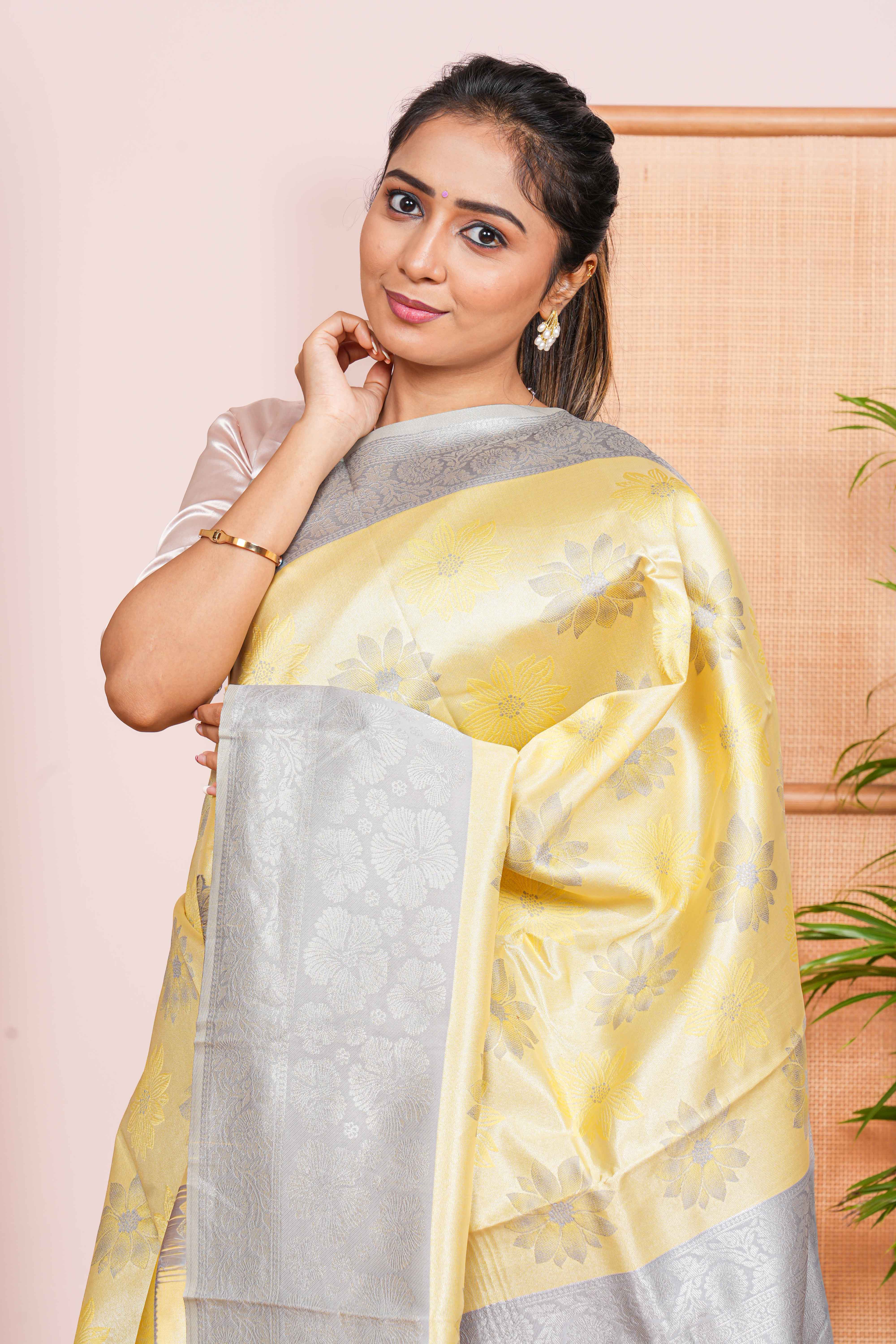 yellow and silver saree