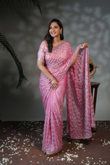 Pink geometric pattern stone work all over body designer saree with scallop design border matching blouse