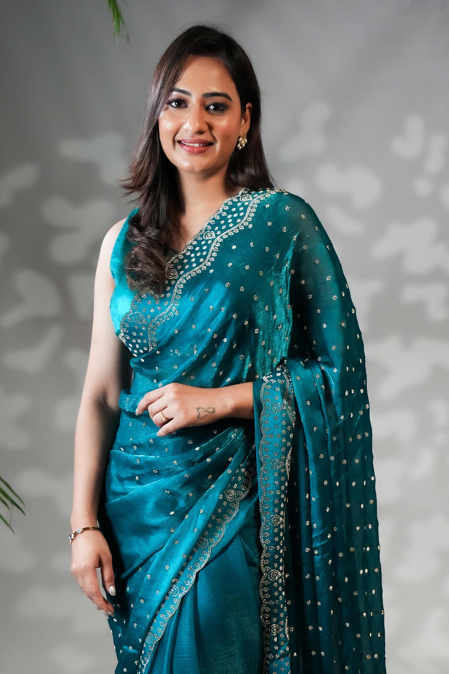 Green Stone work all over body designer saree with scallop design border matching blouse