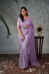 Lavender geometric pattern stone work all over body designer saree with scallop design border matching blouse