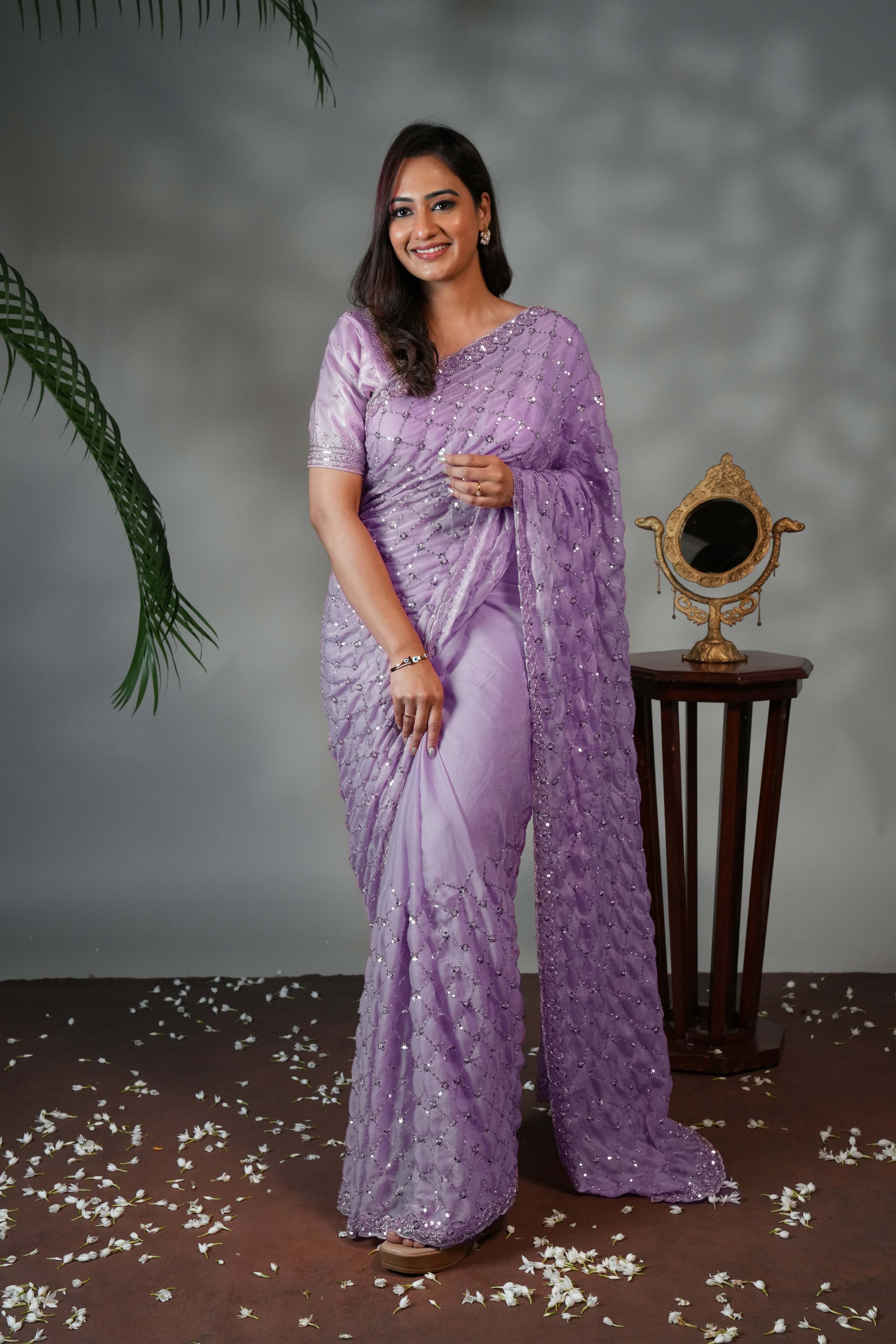 Lavender geometric pattern stone work all over body designer saree with scallop design border matching blouse