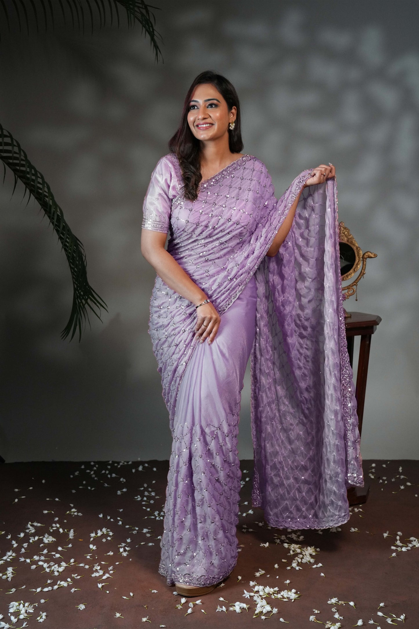 Lavender geometric pattern stone work all over body designer saree with scallop design border matching blouse