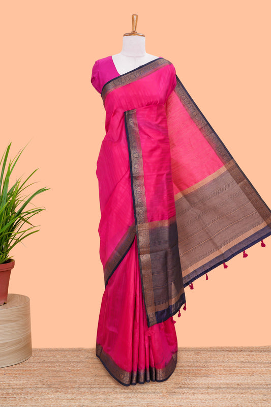 Pink plain raw silk saree with contrast zari border and pallu