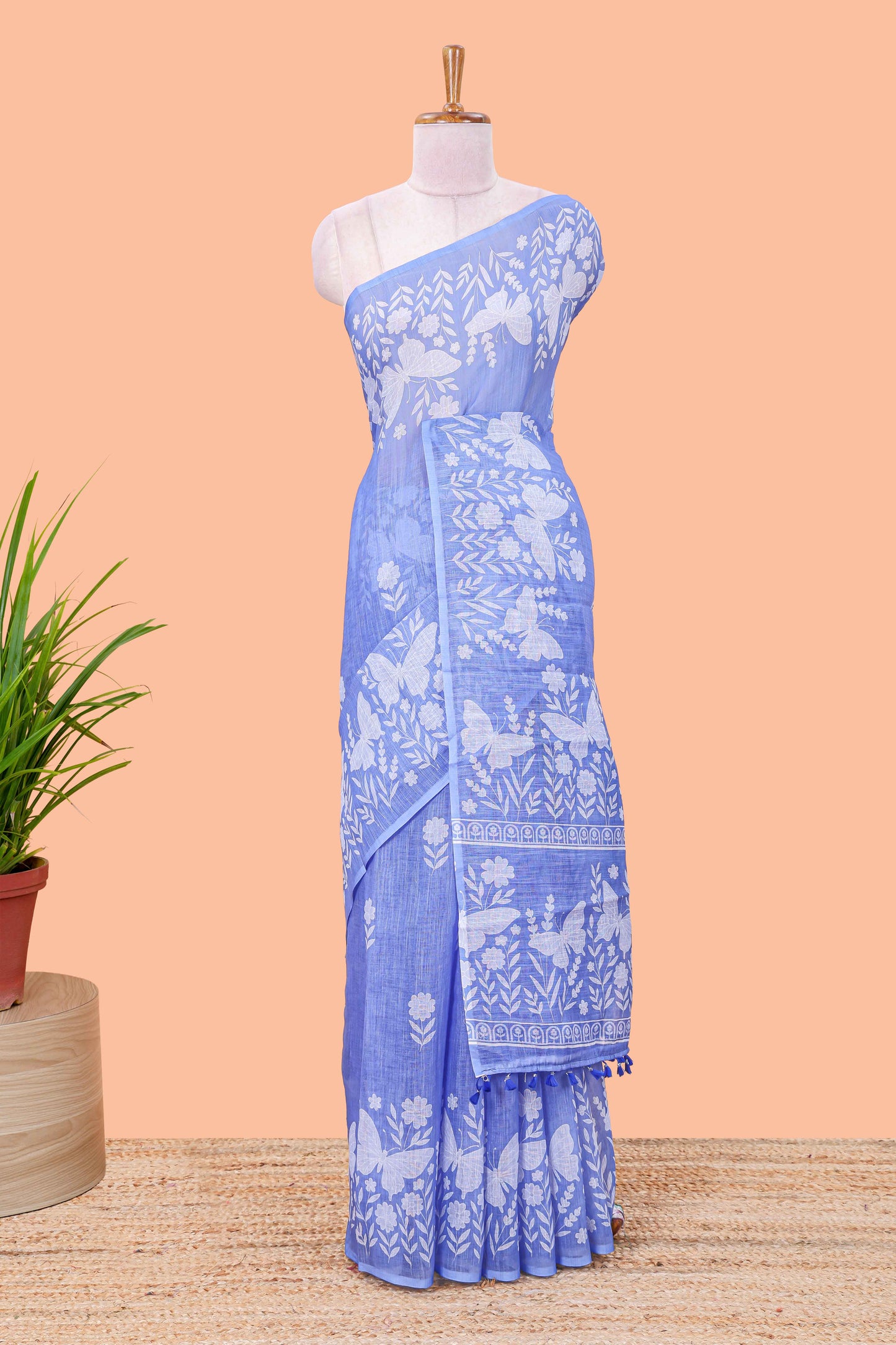 Blue linen cotton saree with floral buttas and butterfly motifs border, Printed self pallu and blouse