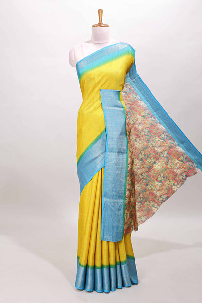 Yellow plain viscose dola silk saree with contrast zari border and floral design pallu