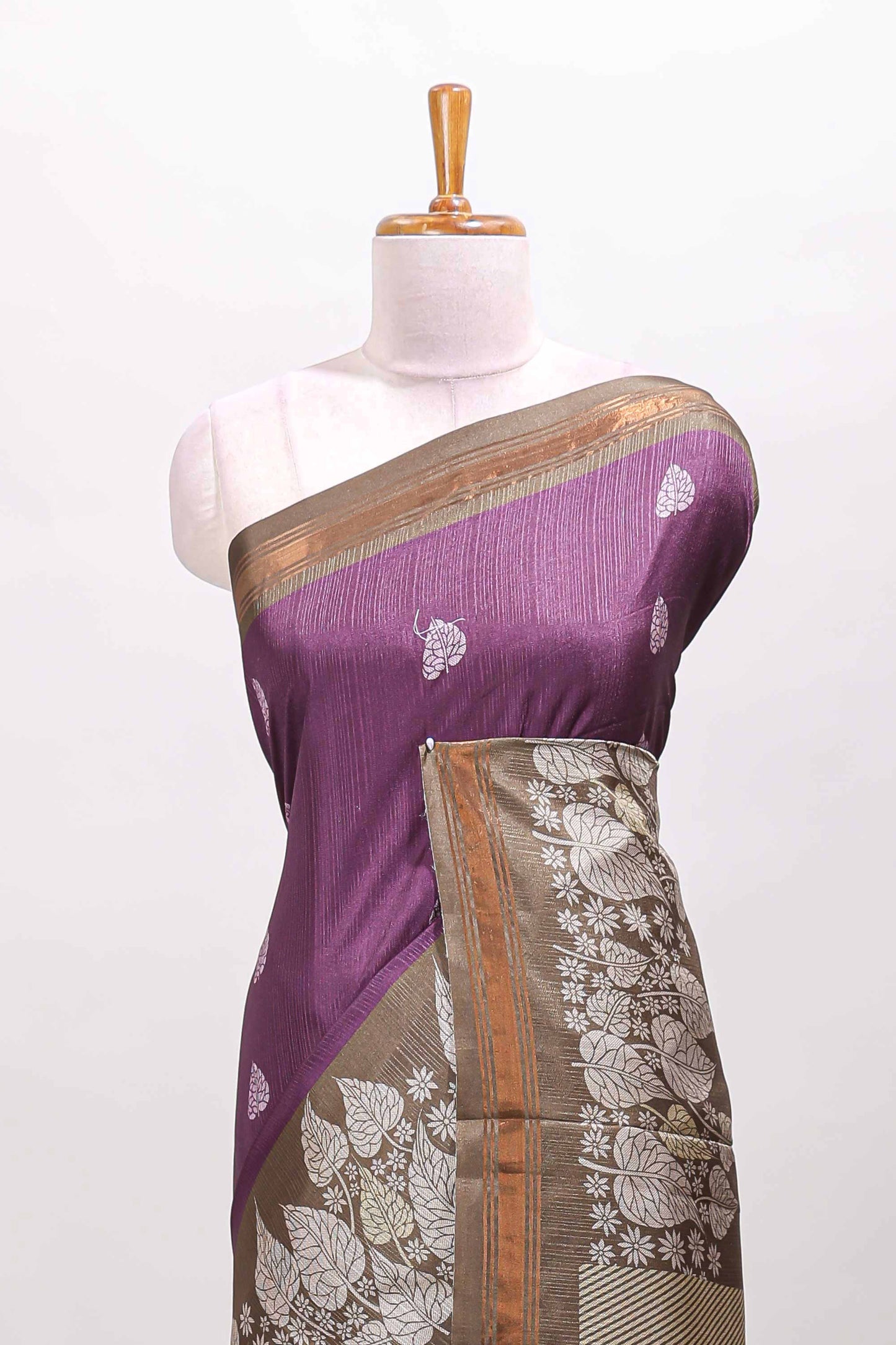 Purple leaf print semi tussar saree with contrast border and geometric pallu