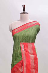 Green checked dola silk saree with contrast zari bentex border and blouse