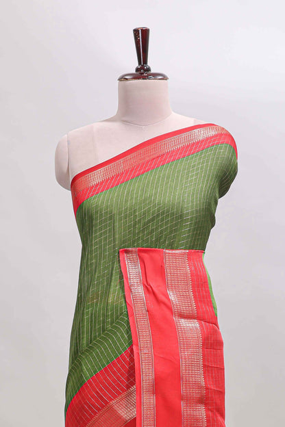 Green checked dola silk saree with contrast zari bentex border and blouse