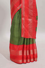 Green checked dola silk saree with contrast zari bentex border and blouse