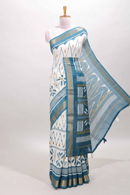 White geometric design ikkat style linen cotton saree with contrast border and striped blouse