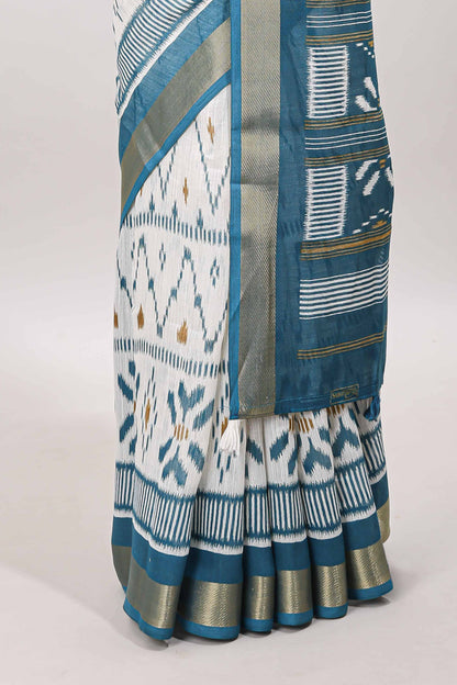White geometric design ikkat style linen cotton saree with contrast border and striped blouse