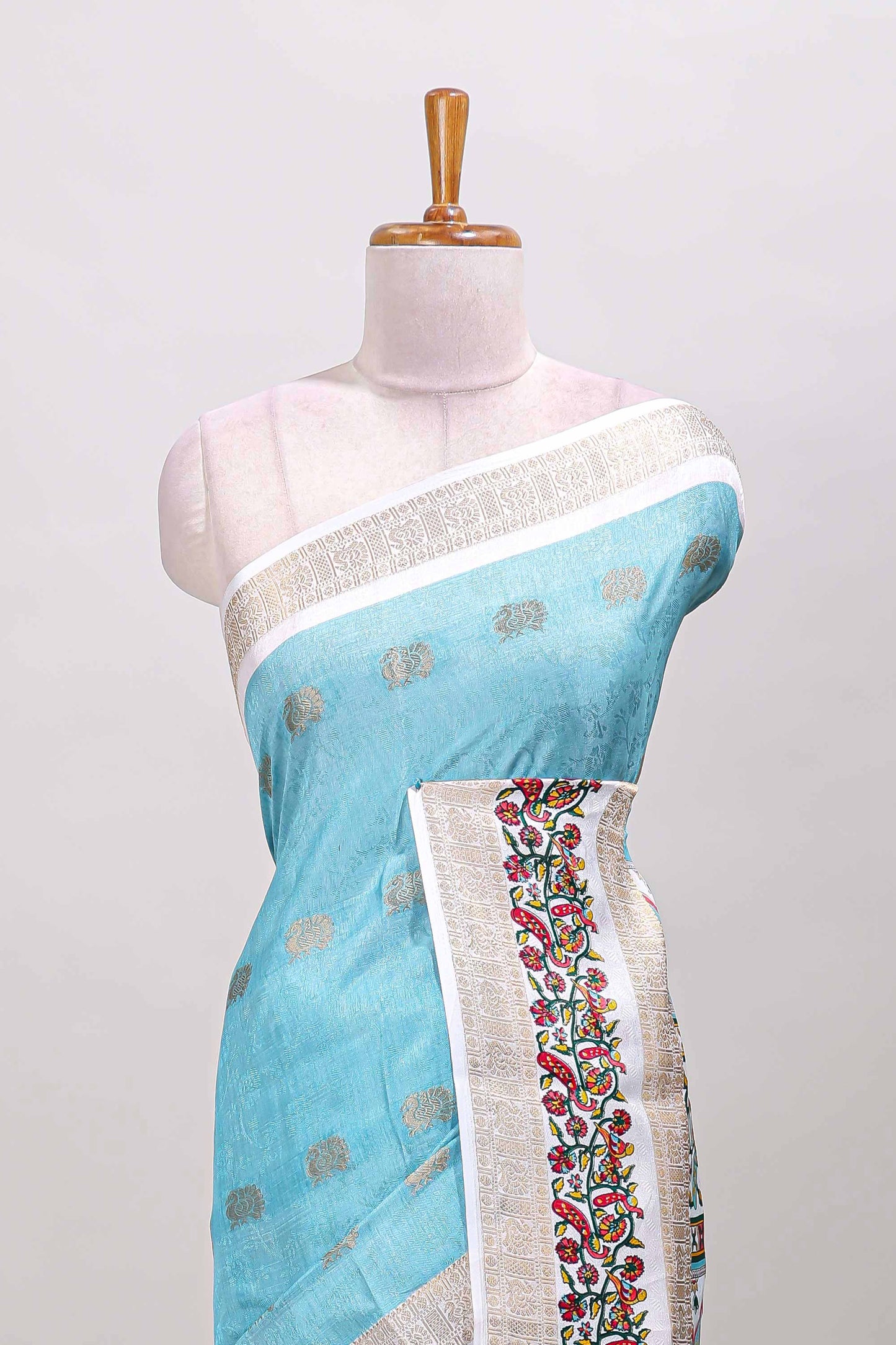 Blue peacock zari motifs dola silk saree with contrast bentex birds and floral vines border and pallu
