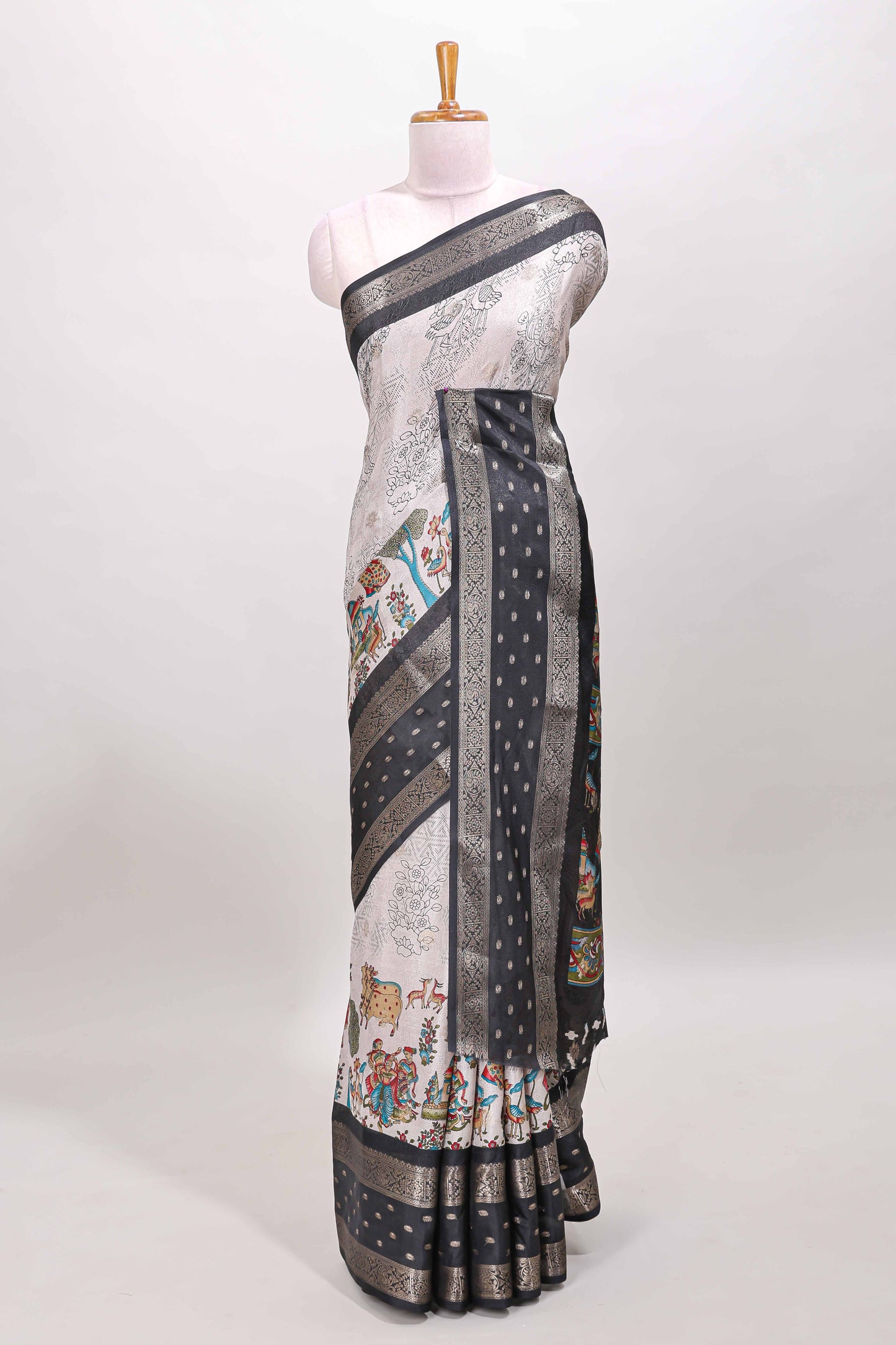 White traditional kalamkari themed marsh georgette saree with contrast black bentex zari border and pallu
