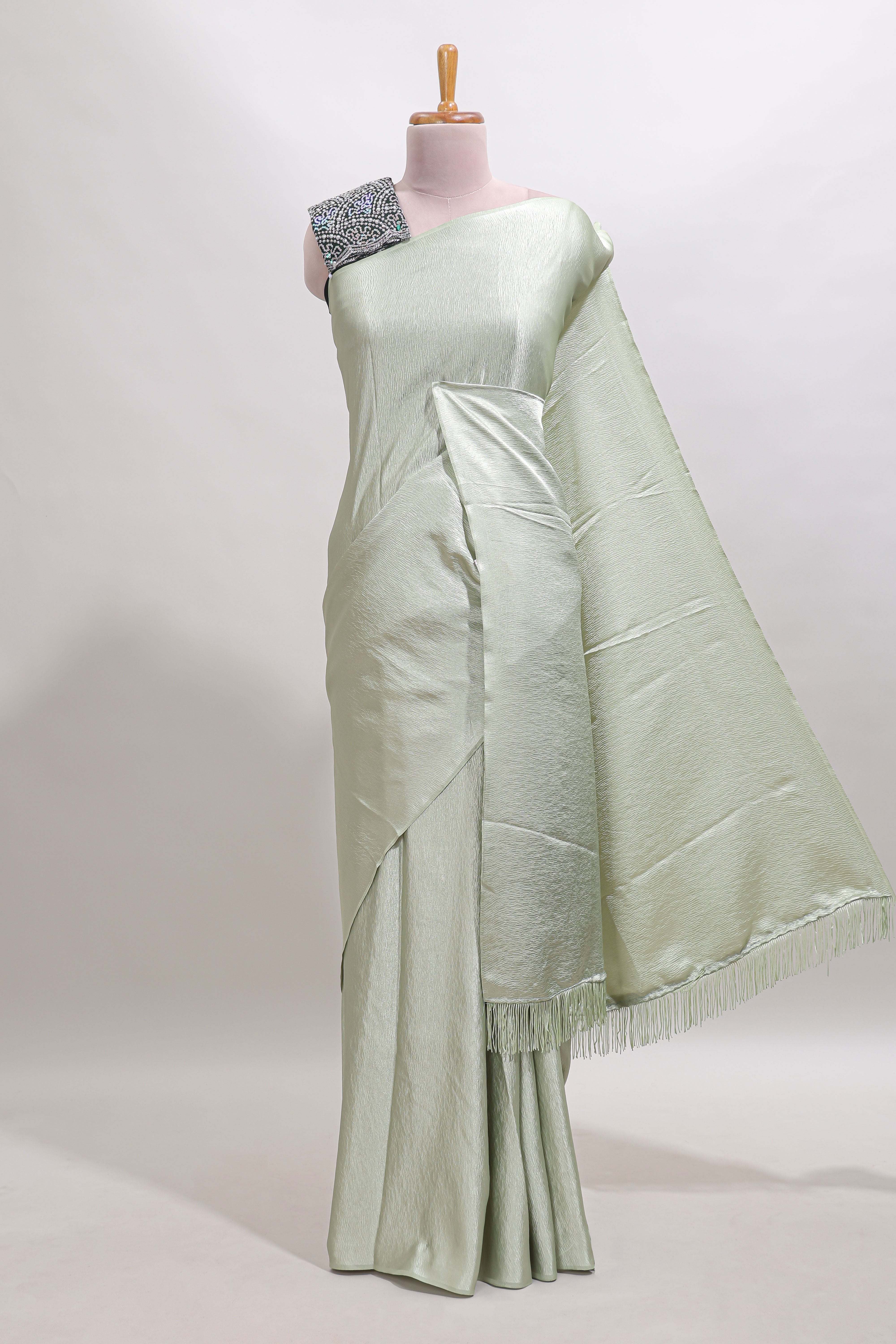 Borderless green plain chiffon saree with contrast embroidery blouse