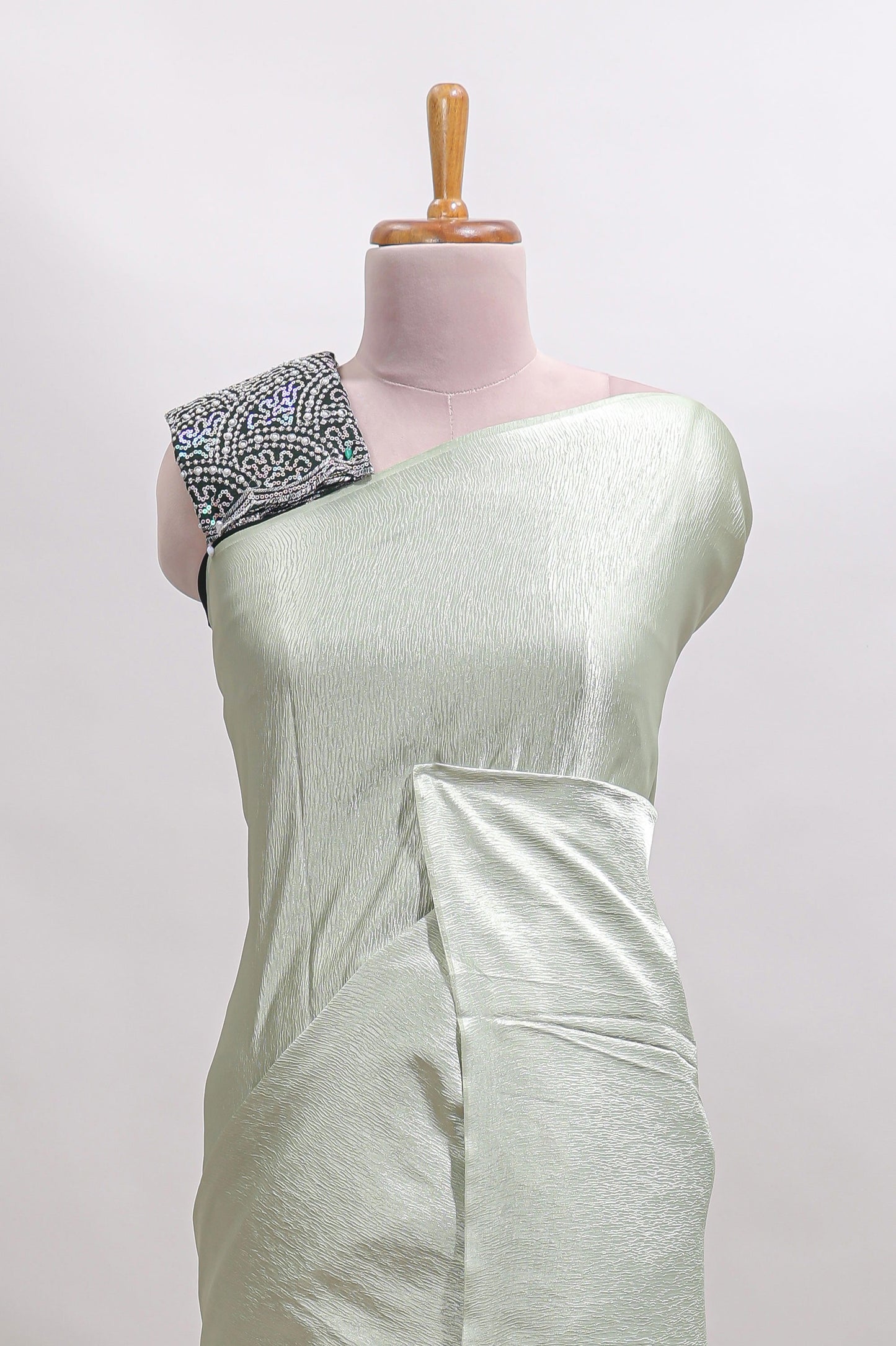 Borderless green plain chiffon saree with contrast embroidery blouse