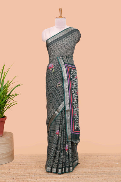 Green moss chiffon saree featuring bandhani design, zari border, contrast blouse and printed pallu