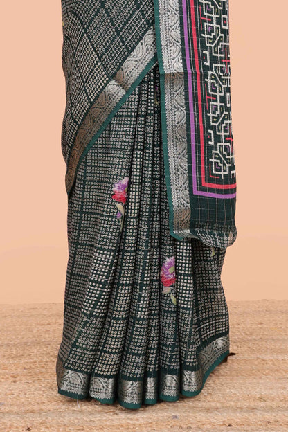 Green moss chiffon saree featuring bandhani design, zari border, contrast blouse and printed pallu