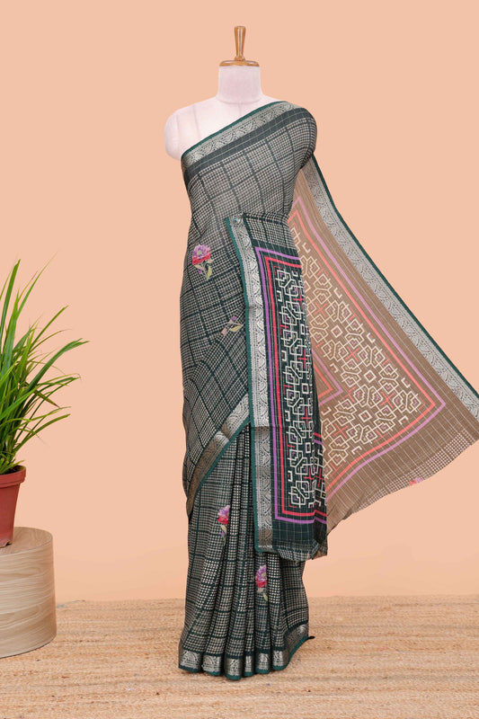 Green moss chiffon saree featuring bandhani design, zari border, contrast blouse and printed pallu