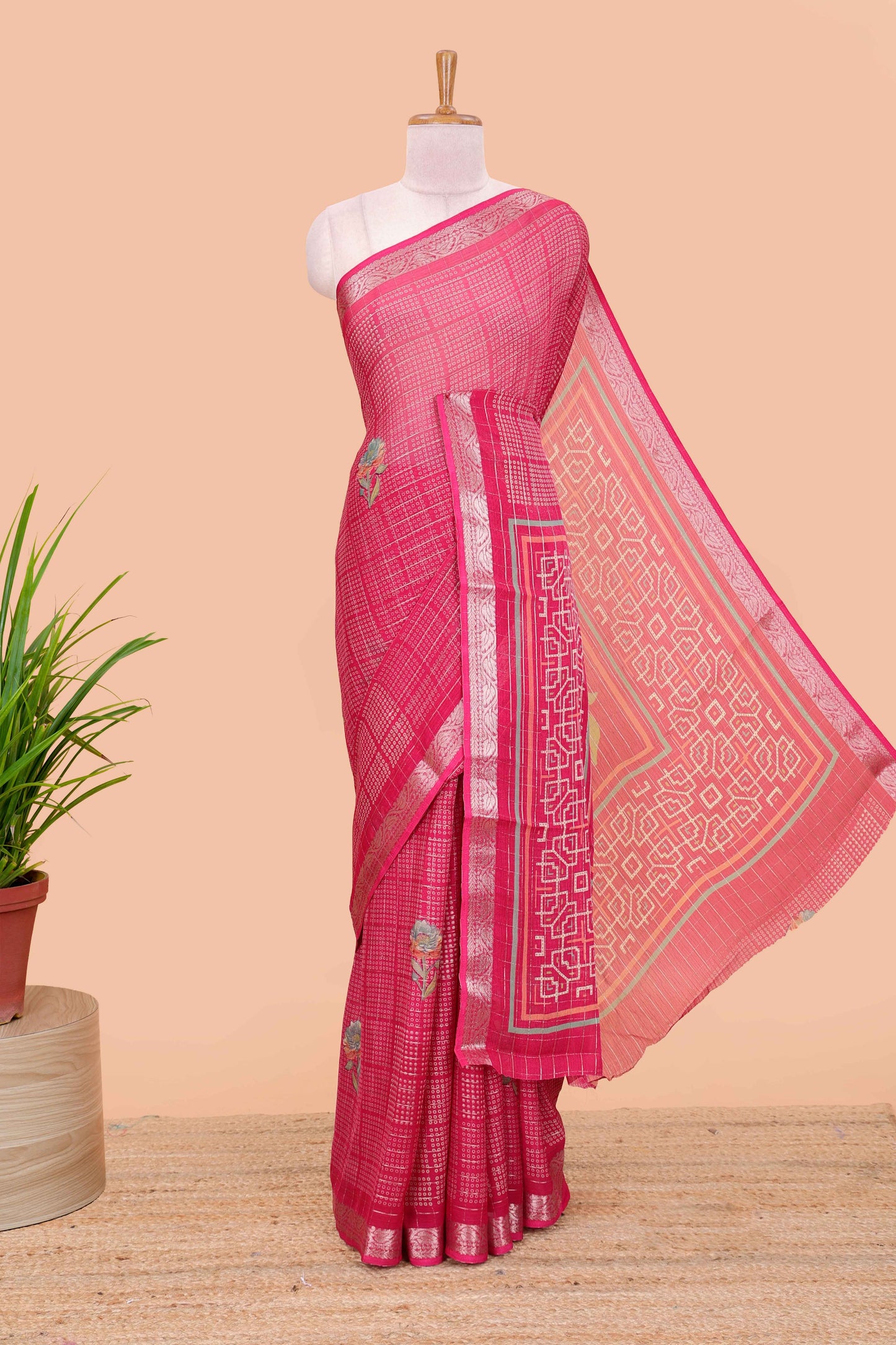 Pink moss chiffon saree featuring bandhani design, zari border, contrast blouse and printed pallu