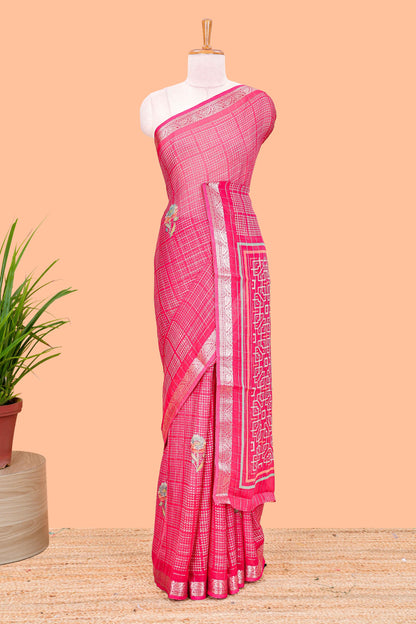 Pink moss chiffon saree featuring bandhani design, zari border, contrast blouse and printed pallu