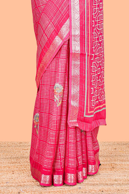 Pink moss chiffon saree featuring bandhani design, zari border, contrast blouse and printed pallu