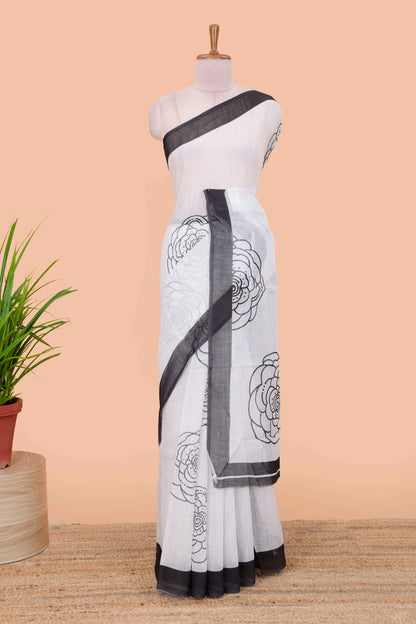 White linen saree with pencil print, contrast border and Blouse