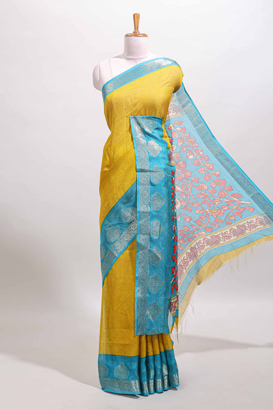 Mustard floral design textured viscose dola silk saree with contrast zari border and printed pallu