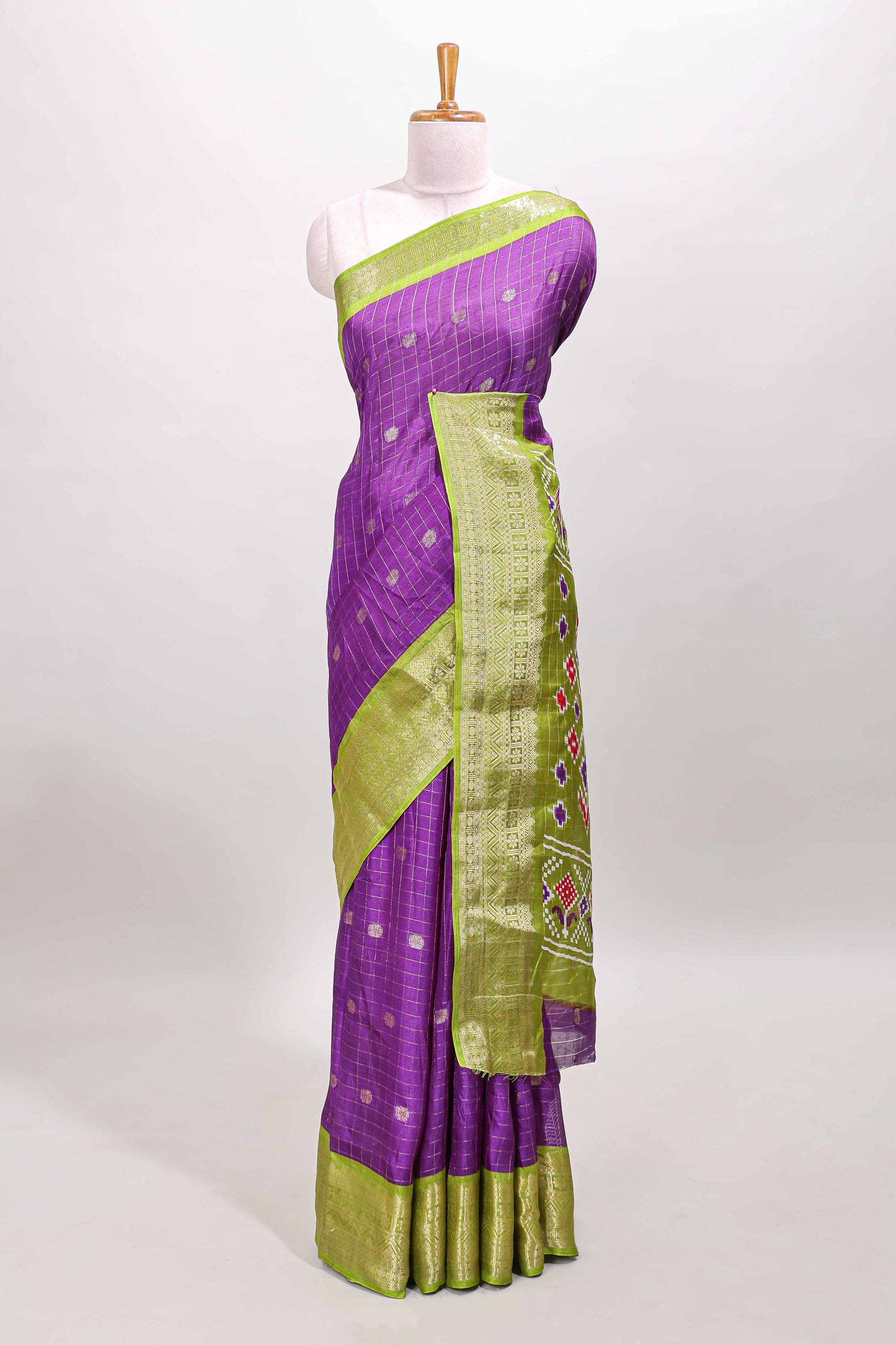 Violet checked zari butta viscose dola silk saree with contrast zari border and ikkat style pallu