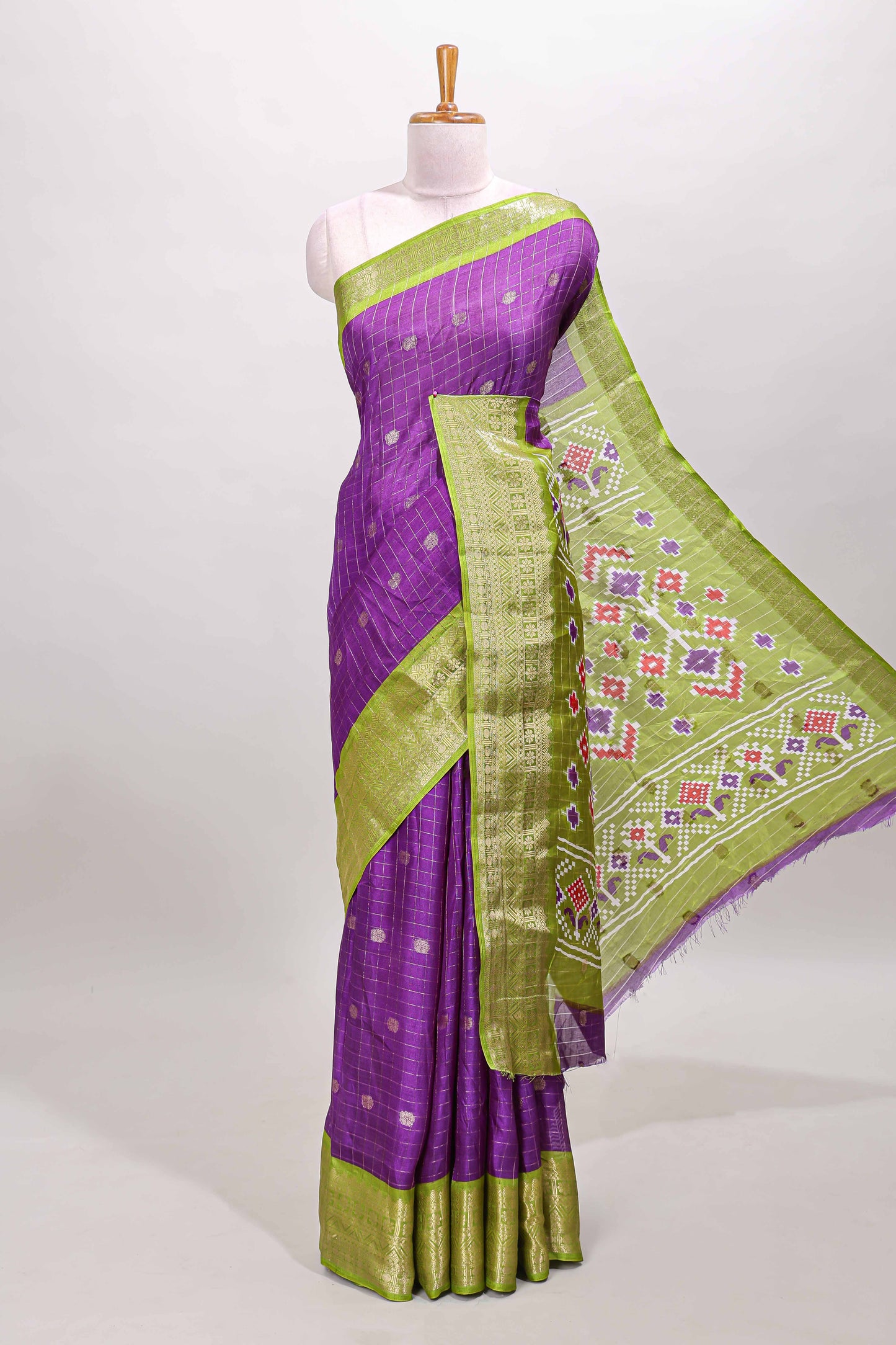 Violet checked zari butta viscose dola silk saree with contrast zari border and ikkat style pallu