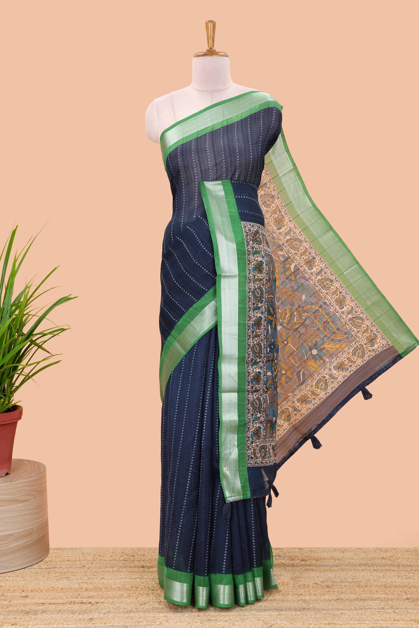Dark blue linen cotton striped saree with contrast silver zari border and kalamkari pallu