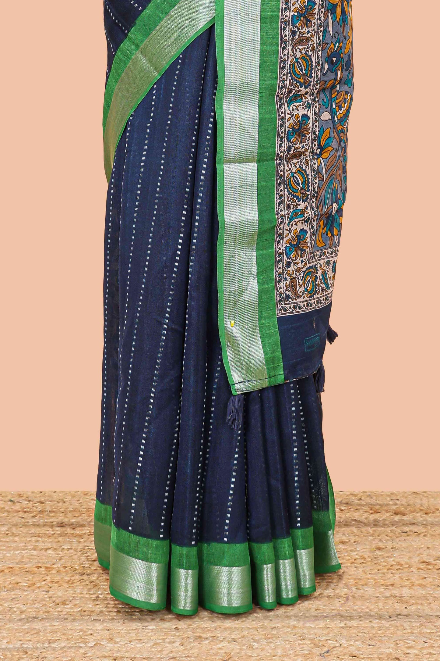 Dark blue linen cotton striped saree with contrast silver zari border and kalamkari pallu