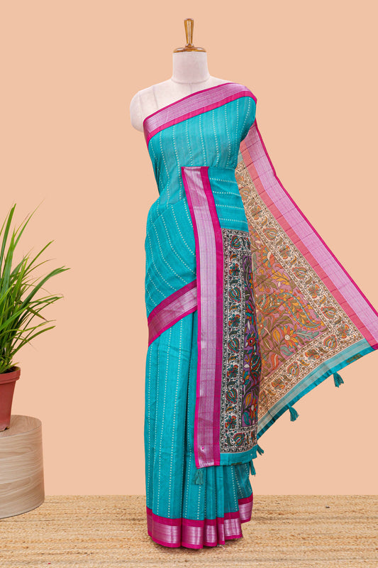 Pecock green linen cotton striped saree with contrast silver zari border and kalamkari pallu