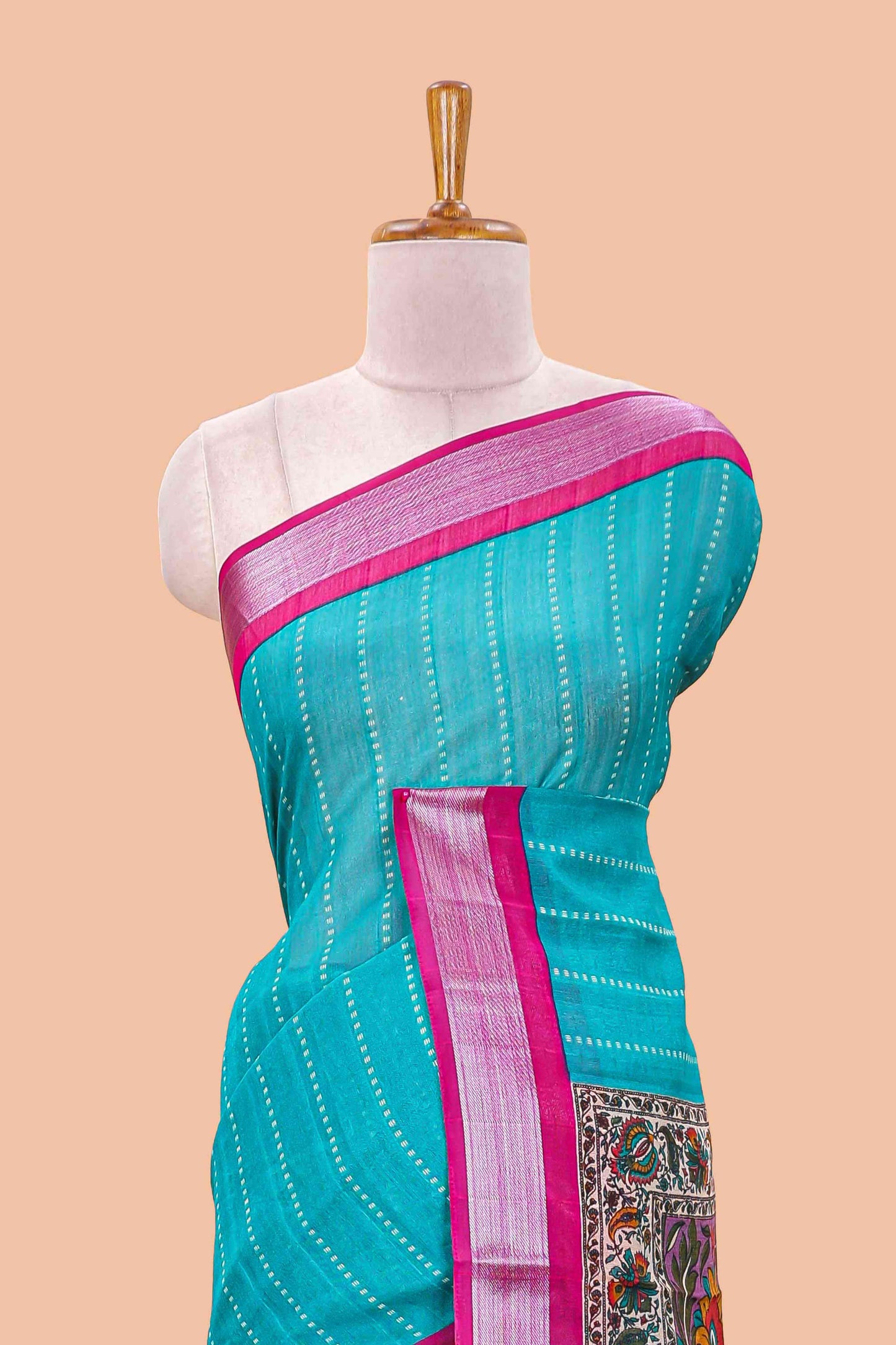 Pecock green linen cotton striped saree with contrast silver zari border and kalamkari pallu