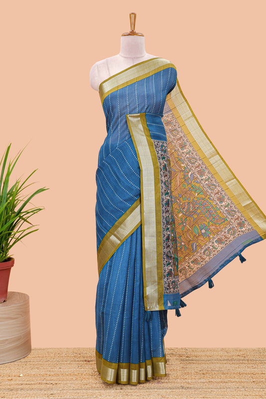 Blue linen cotton striped saree with contrast silver zari border and kalamkari pallu