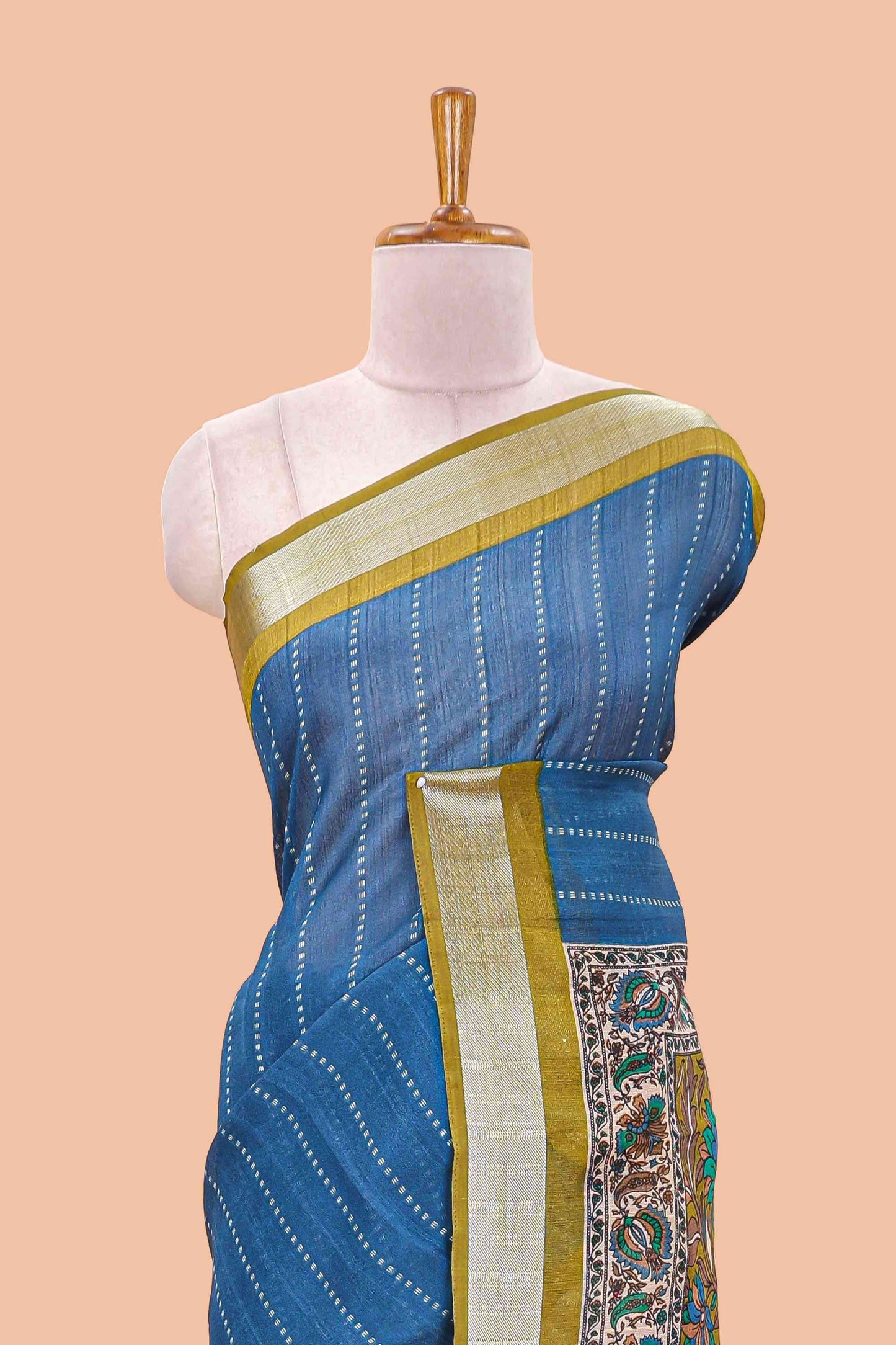 Blue linen cotton striped saree with contrast silver zari border and kalamkari pallu