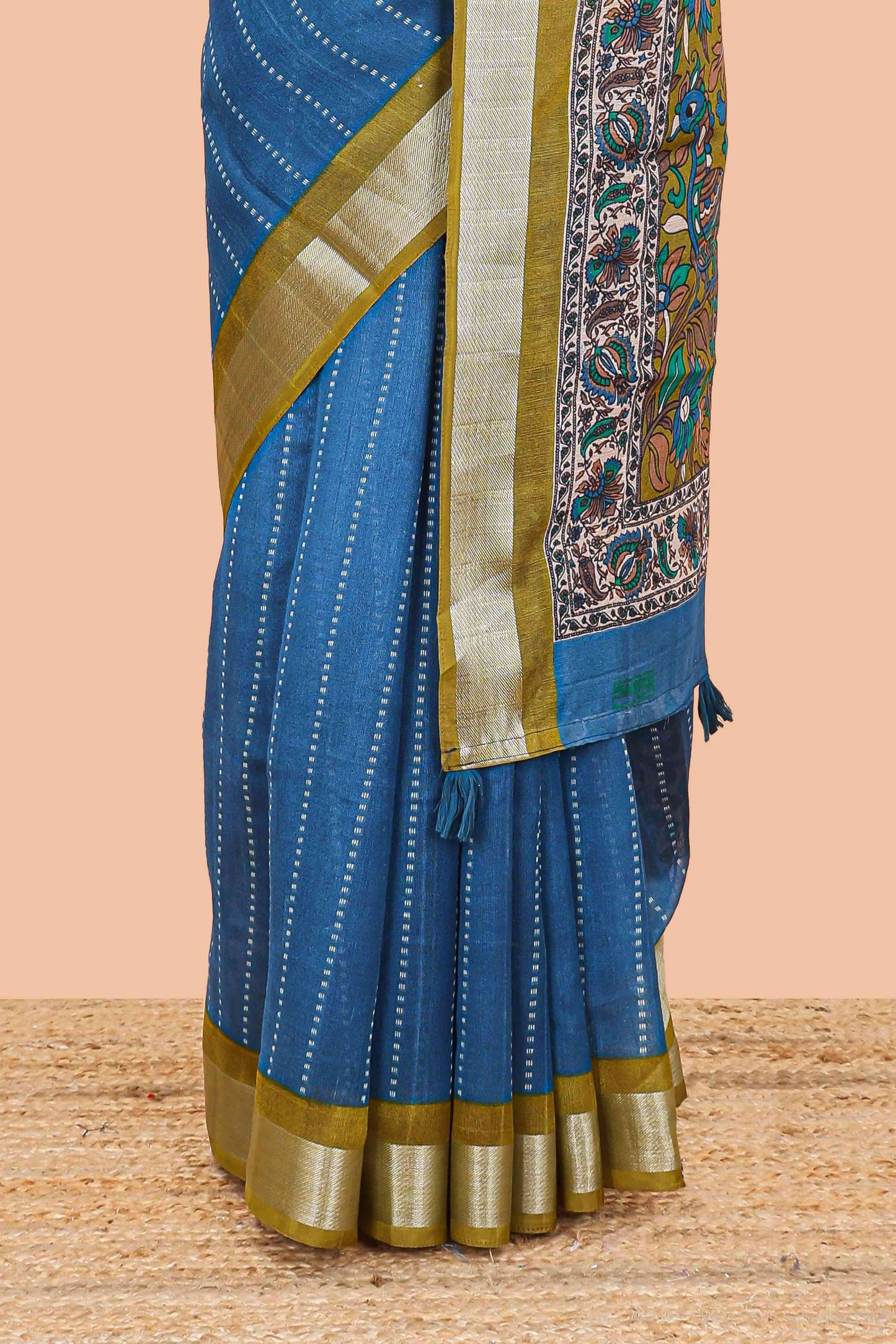 Blue linen cotton striped saree with contrast silver zari border and kalamkari pallu