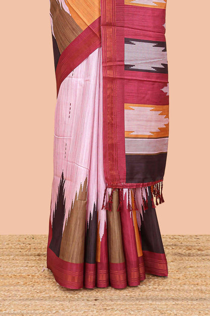 Pink tussar silk saree with chevron ikkat design and geometrical zari border and pallu