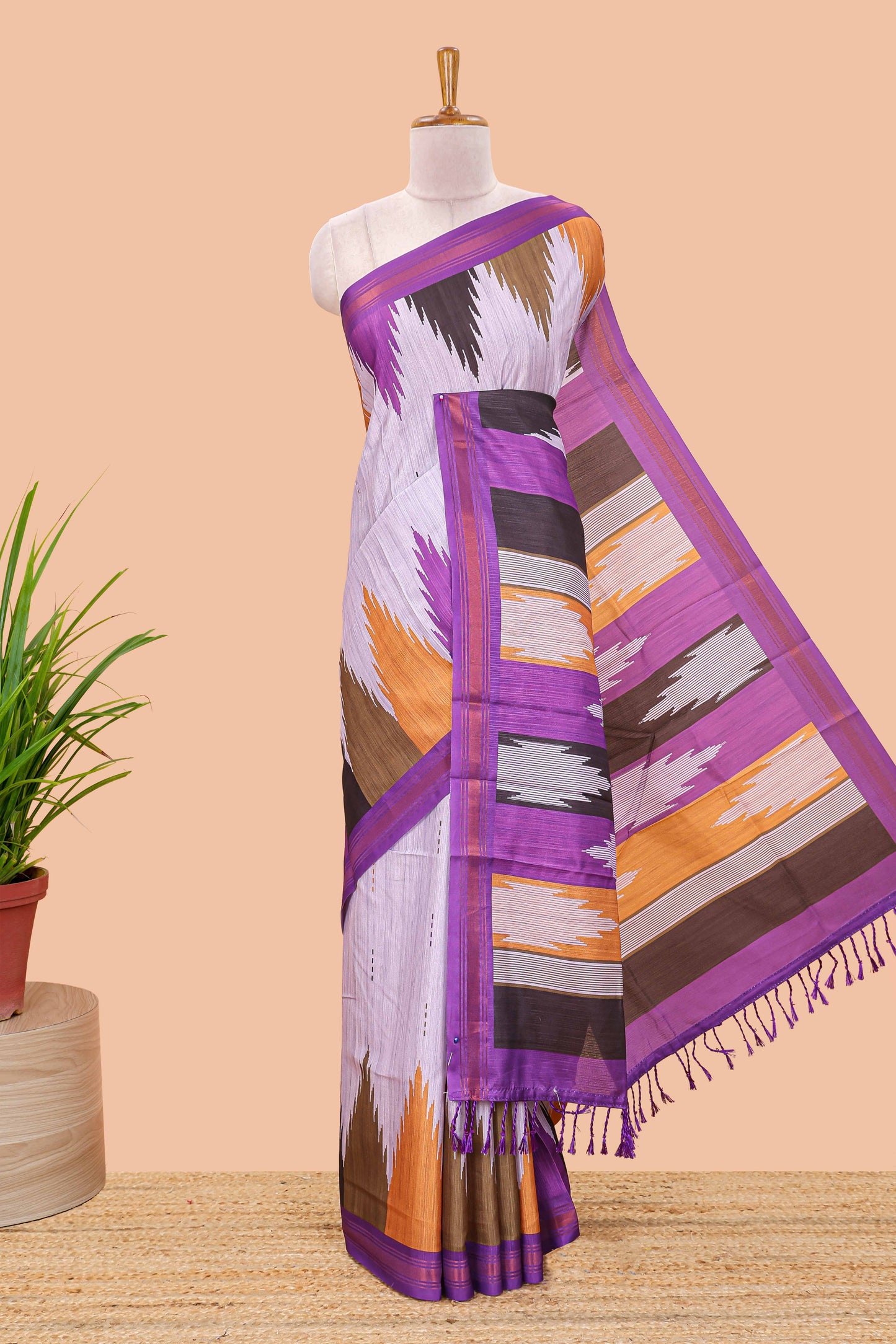 Lavender tussar silk saree with chevron ikkat design and geometrical zari border and pallu