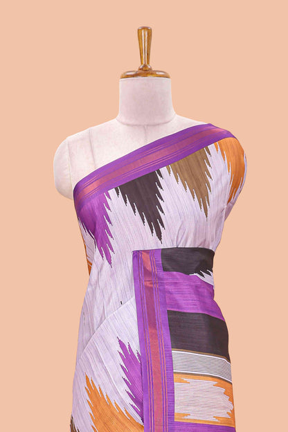 Lavender tussar silk saree with chevron ikkat design and geometrical zari border and pallu