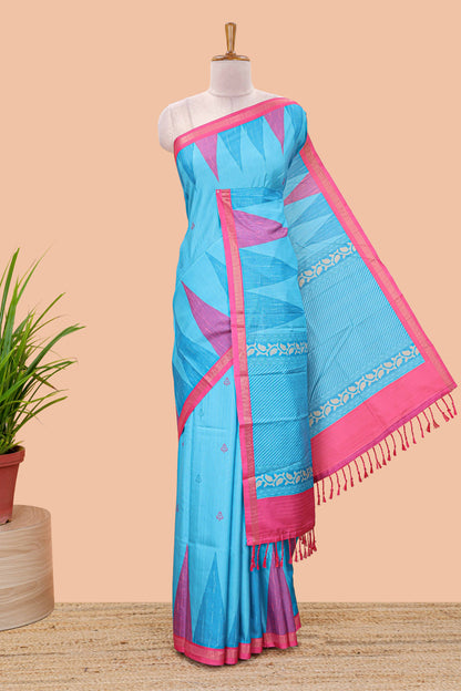 Blue semi tussar silk saree with all over paisley butta, geometric ikkat pattern and zari border
