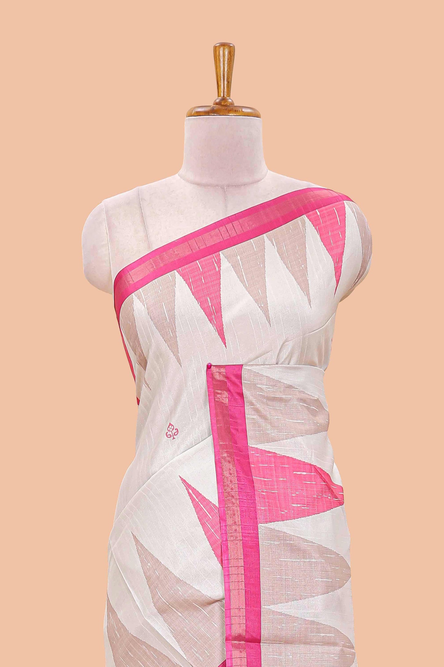 Sandal semi tussar silk saree with all over paisley butta, geometric ikkat pattern and zari border