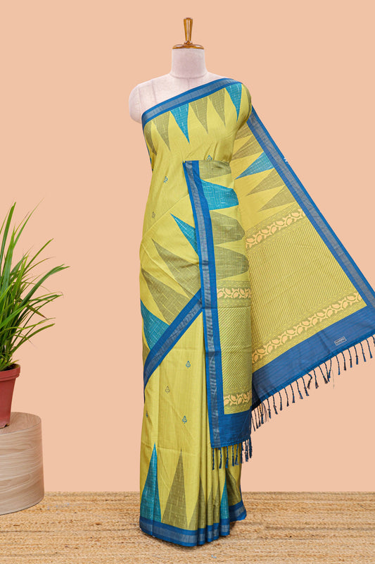 Green semi tussar silk saree with all over paisley butta, geometric ikkat pattern and zari border
