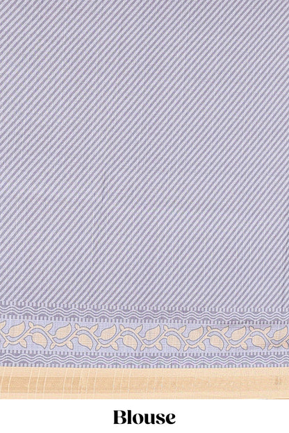 Grey semi tussar silk saree with all over paisley butta, geometric ikkat pattern and zari border