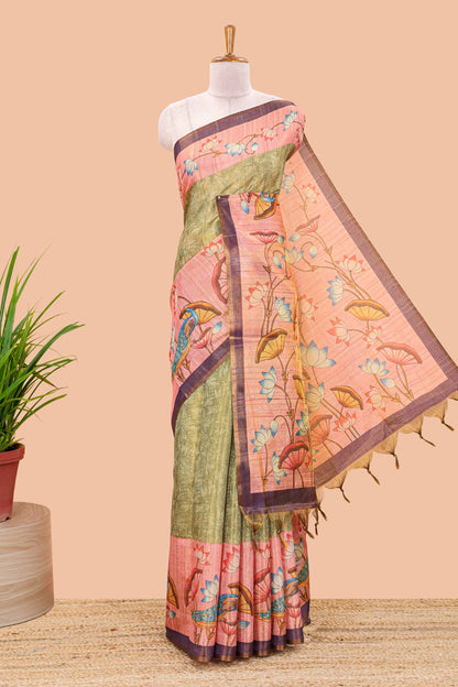 Green tissue tussar saree with lotus jaal pallu and scattered lotus motif blouse