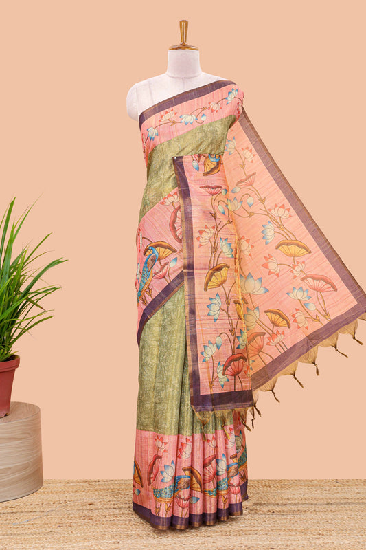 Green tissue tussar saree with lotus jaal pallu and scattered lotus motif blouse